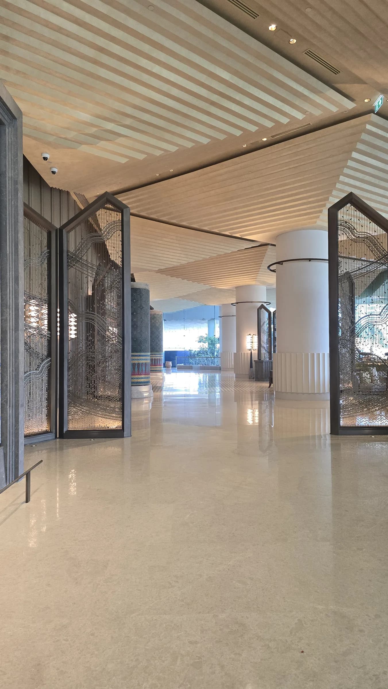 The lobby approach already showed the new hotel's clean, edited mood.