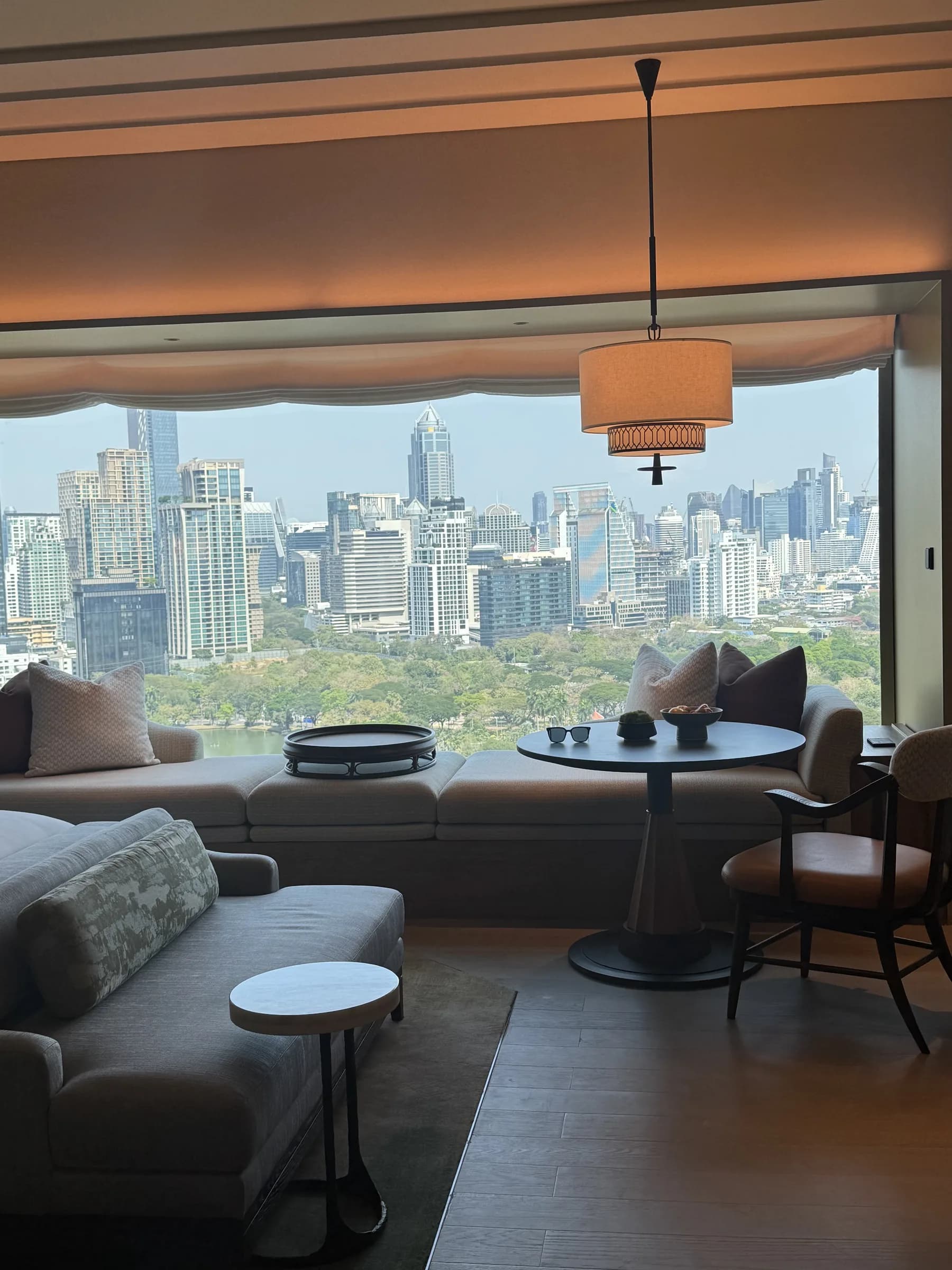 The room view opens directly to Lumpini Park, which is why the Deluxe category felt stronger than its size alone.